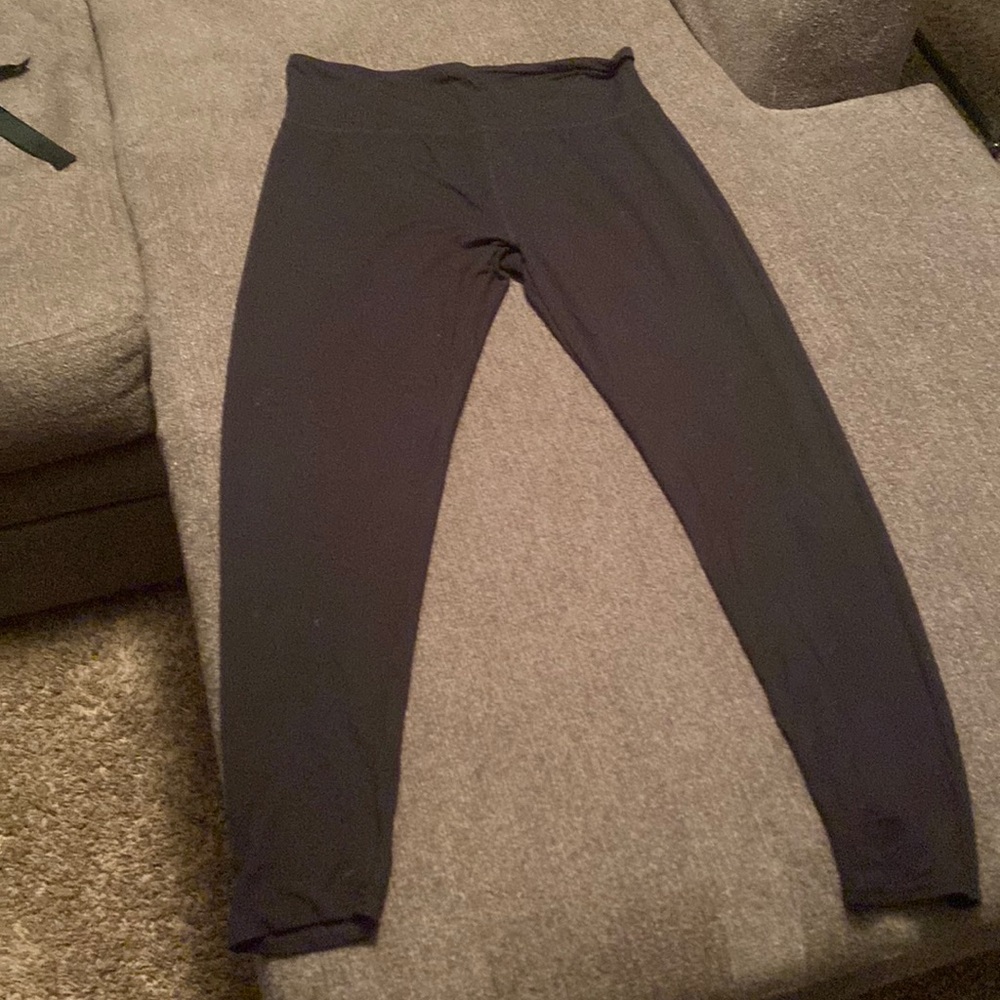 Star above branded black leggings